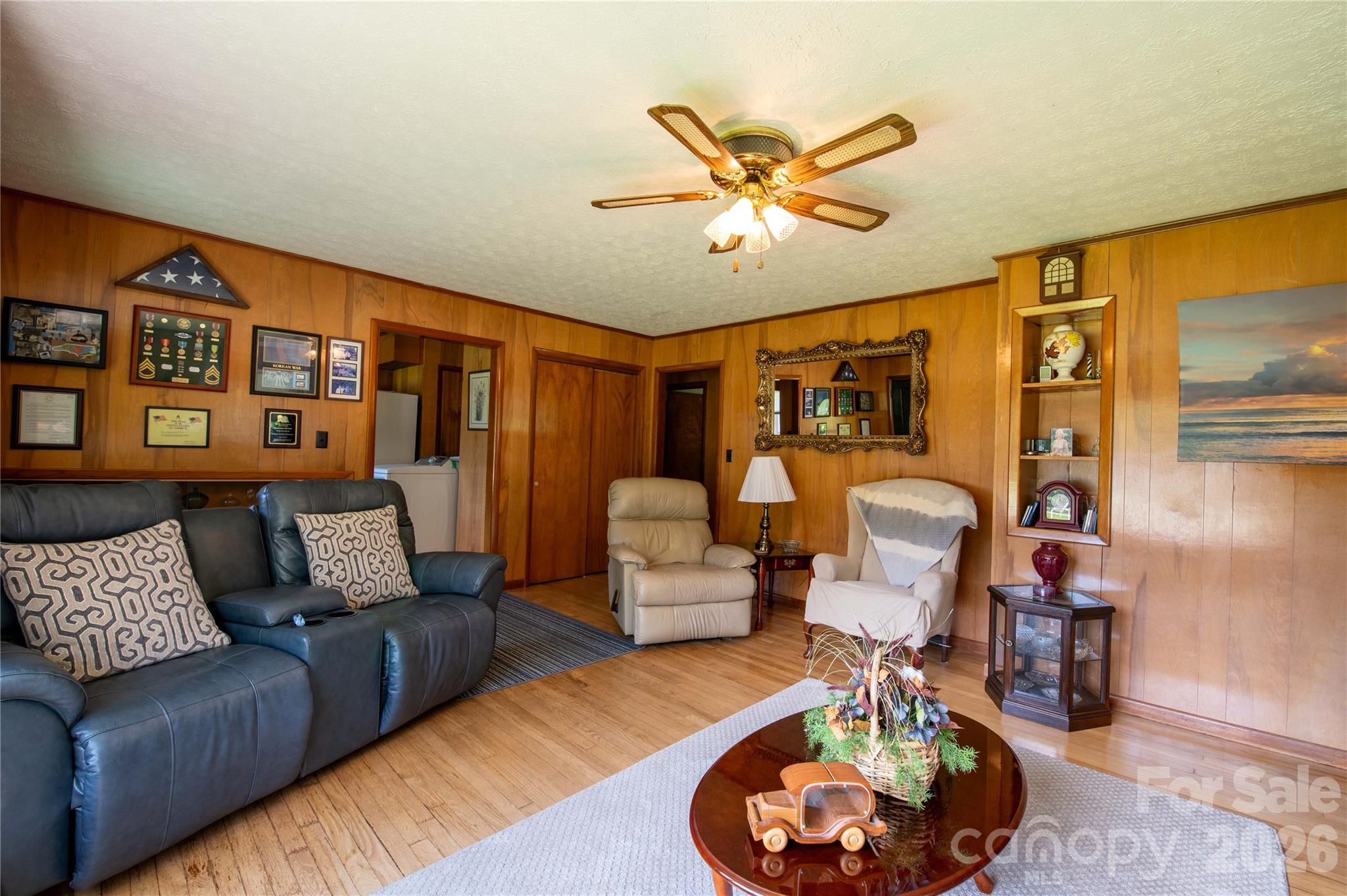 40 Double Island Road Burnsville, NC 28714 - Photo 8 of 38 a living room with furniture and wooden floor