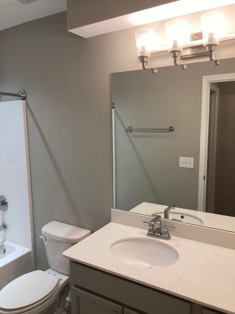 3526 Learning Lane Murfreesboro, TN 37128 - Photo 13 of 15 a bathroom with a sink toilet and mirror