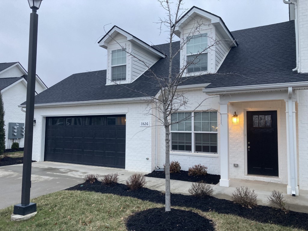 3526 Learning Lane Murfreesboro, TN 37128 - Photo 2 of 15 a front view of a house with garden