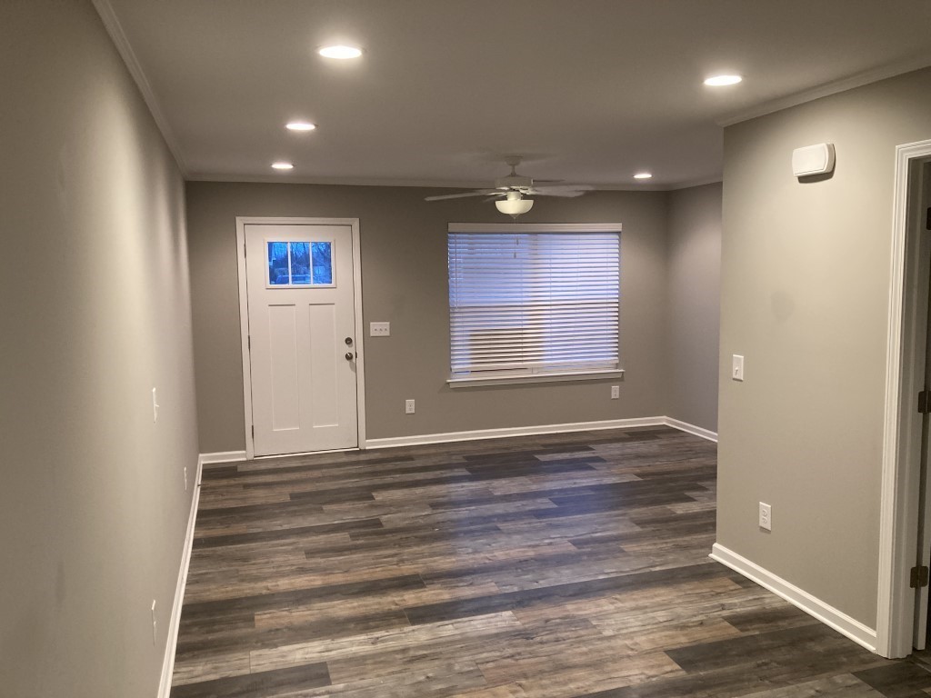 3526 Learning Lane Murfreesboro, TN 37128 - Photo 3 of 15 a view of an empty room with wooden floor and a window