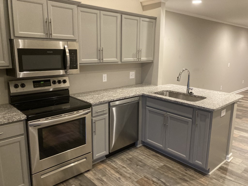 3526 Learning Lane Murfreesboro, TN 37128 - Photo 5 of 15 a kitchen with a stove and a microwave