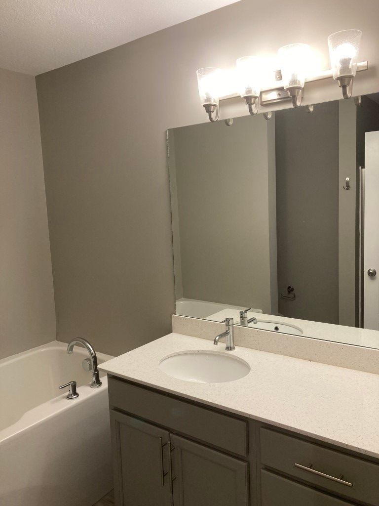 3526 Learning Lane Murfreesboro, TN 37128 - Photo 9 of 15 a bathroom with a sink and a mirror