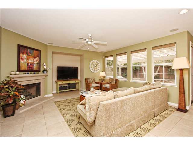 536 Rudder Avenue Carlsbad, CA 92011 - Photo 4 of 20 Family room with fireplace and open to the kitchen.
