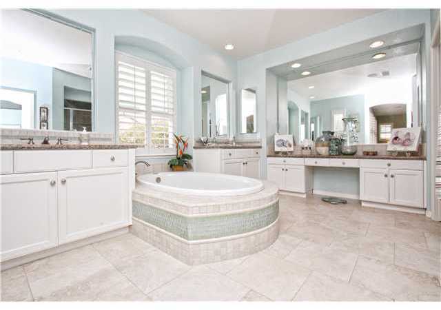 536 Rudder Avenue Carlsbad, CA 92011 - Photo 10 of 20 Master bathroom with granite his and her vanities, large tub and separate shower.