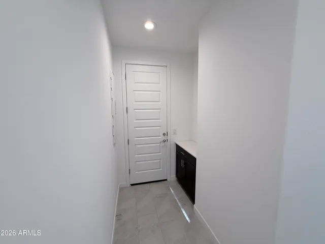 a view of walk in closet with racks