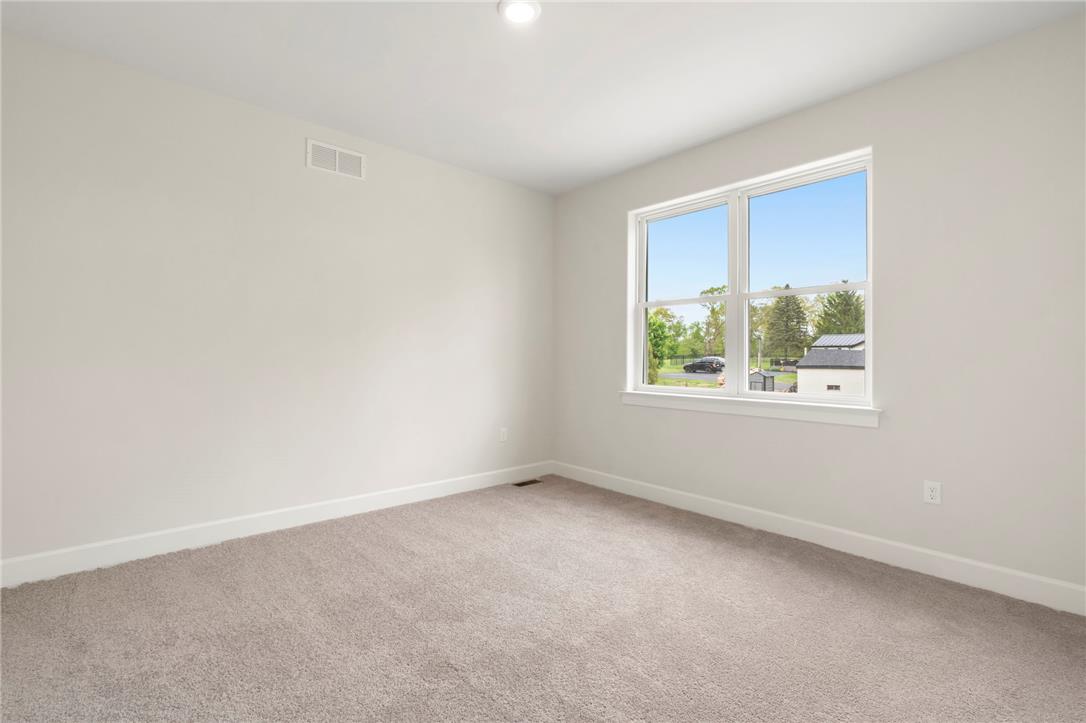 Hottle Road Quakertown, PA 18951 - Photo 36 of 59 Soft carpeting pairs with a large window in this versatile secondary bedroom space.