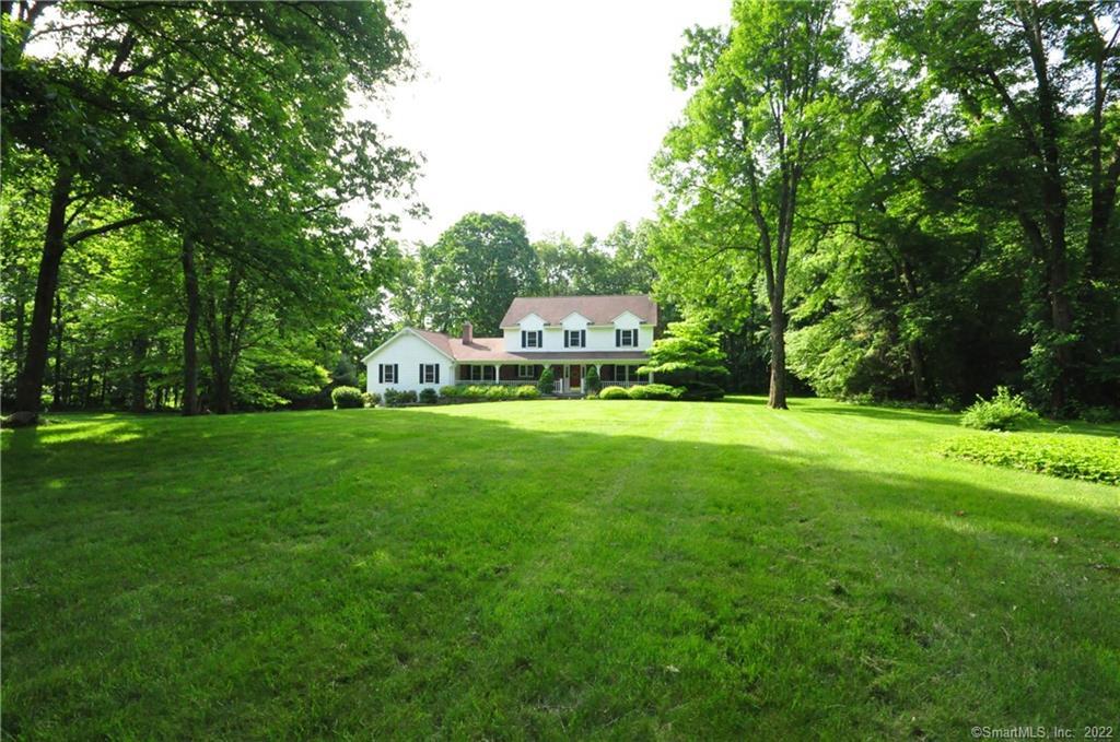 a view of a house with a big yard
