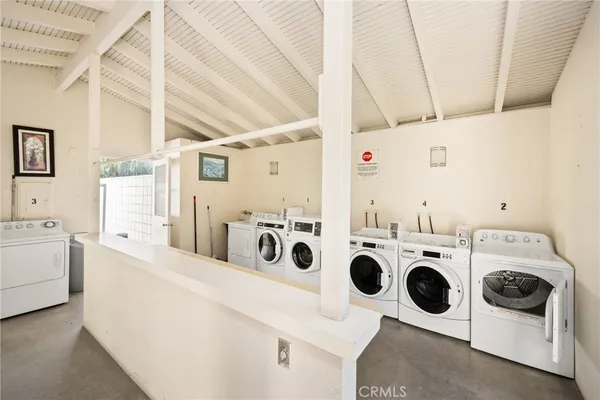 a view of street with parked cars