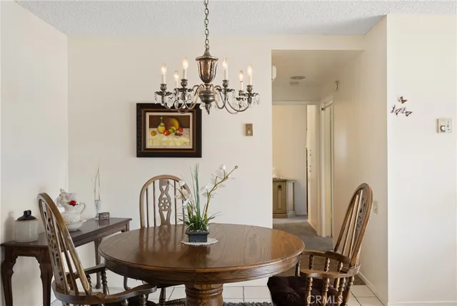 a kitchen with stainless steel appliances a stove a sink and a refrigerator