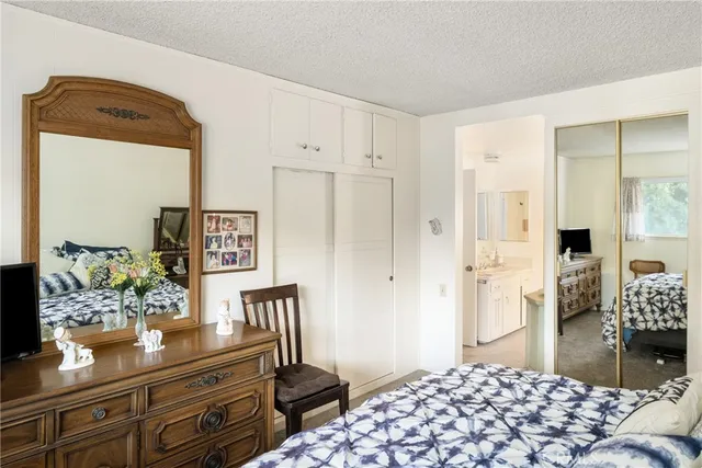 a bathroom with a double vanity sink and mirror