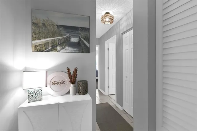 a bathroom with a toilet a sink and a mirror