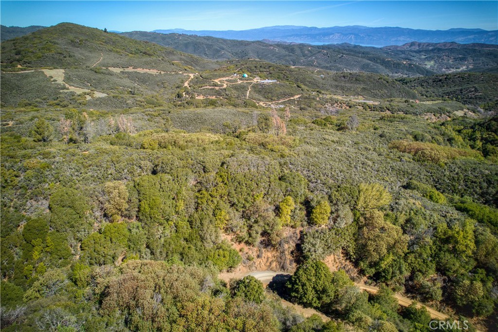 10625 Adobe Creek Road Hopland, CA 95449 - Photo 3 of 8 a view of a lush green hillside and a mountain