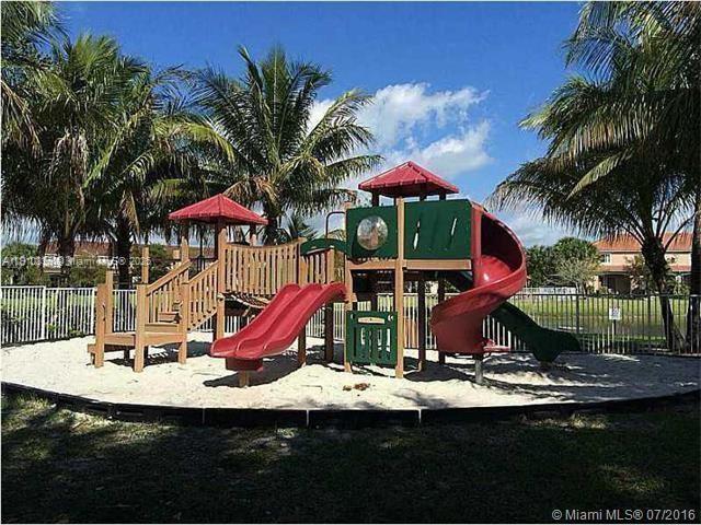 2551 Southwest 83rd Avenue, Unit 107 Miramar, FL 33025 - Photo 16 of 19 a view of a park with slide