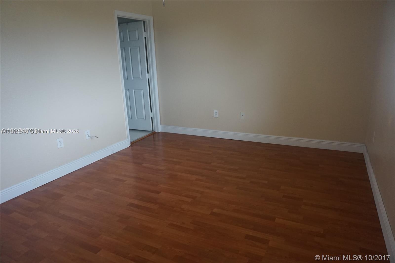 2551 Southwest 83rd Avenue, Unit 107 Miramar, FL 33025 - Photo 8 of 19 an empty room with an empty space
