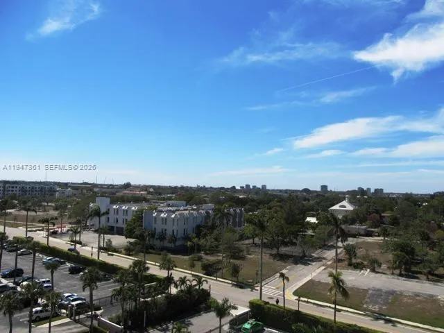 a view of a garden with a pathway