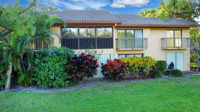 a view of a golf course with a lake