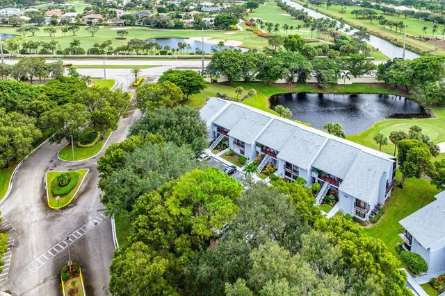 a view of a patio with a table chairs and a porch