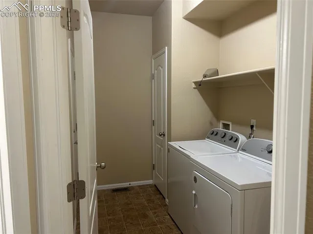 a bathroom with a sink and vanity