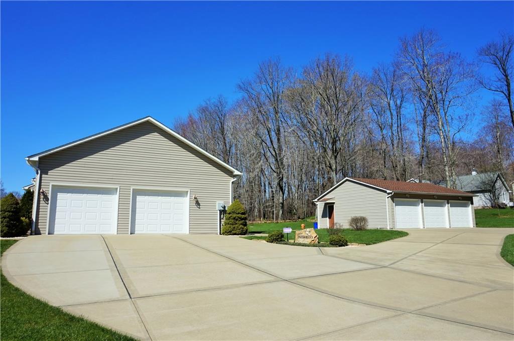 421 Kriess Road Renfrew, PA 16053 - Photo 3 of 25 Concrete driveway leading to all garage stalls!