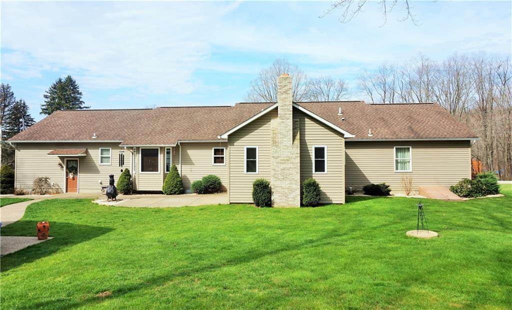 421 Kriess Road Renfrew, PA 16053 - Photo 4 of 25 Private rear yard with invisible fence, patio, and walkway to the detached garage!
