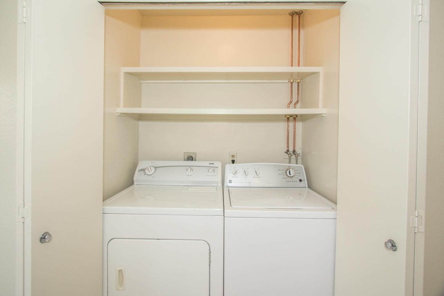 740 Pinta Lane Foster City, CA 94404 - Photo 16 of 33 a utility room with dryer and washer