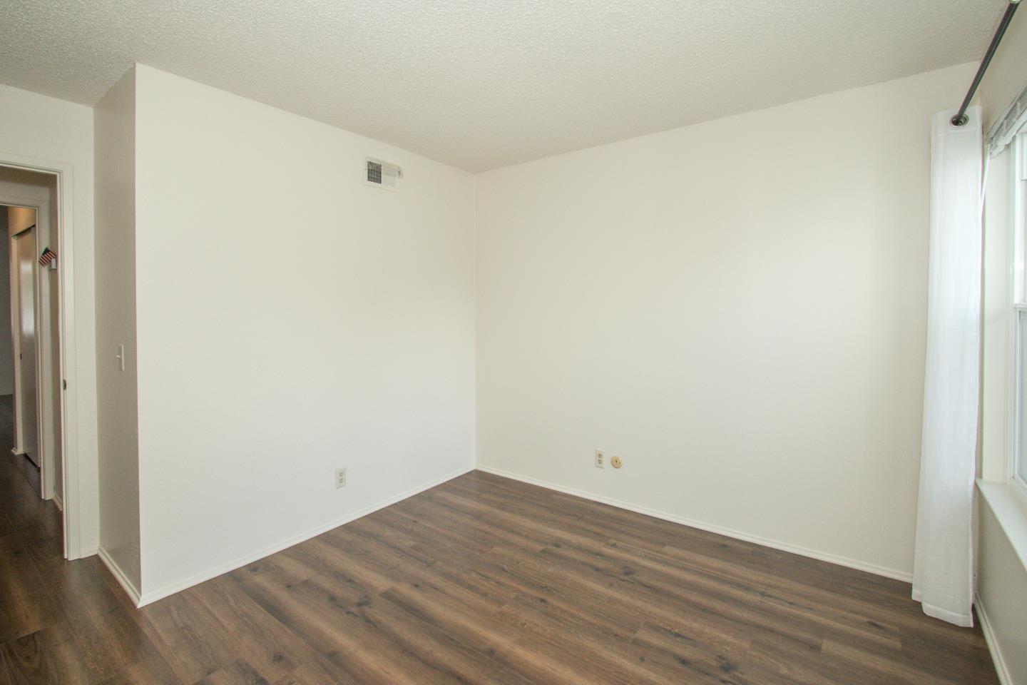 740 Pinta Lane Foster City, CA 94404 - Photo 18 of 33 a view of a room with wooden floor