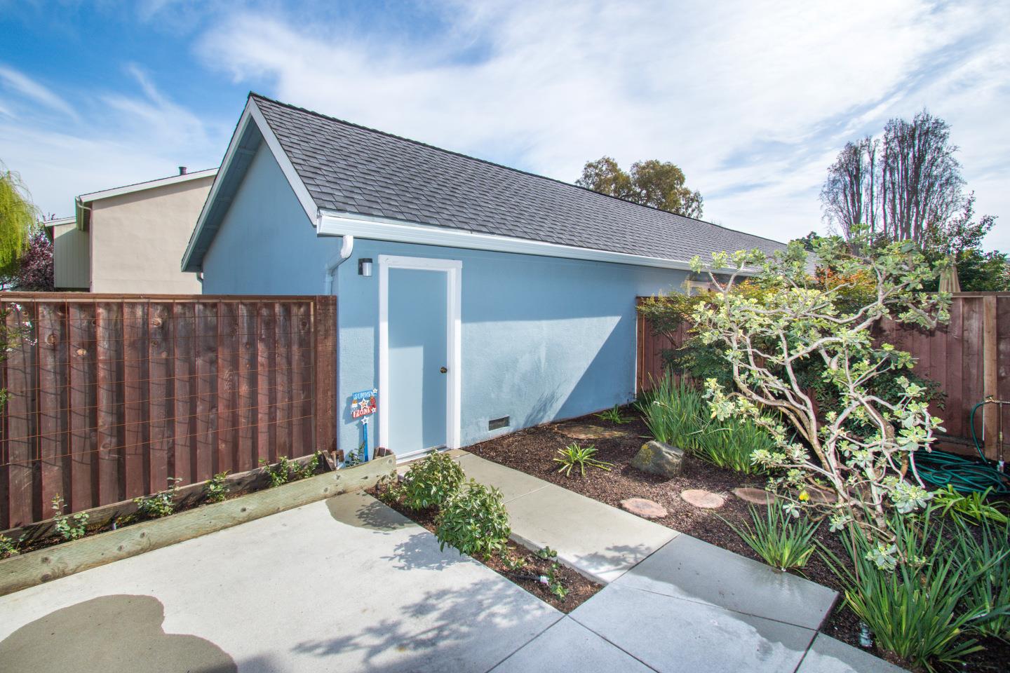 740 Pinta Lane Foster City, CA 94404 - Photo 26 of 33 a front view of a house with garden