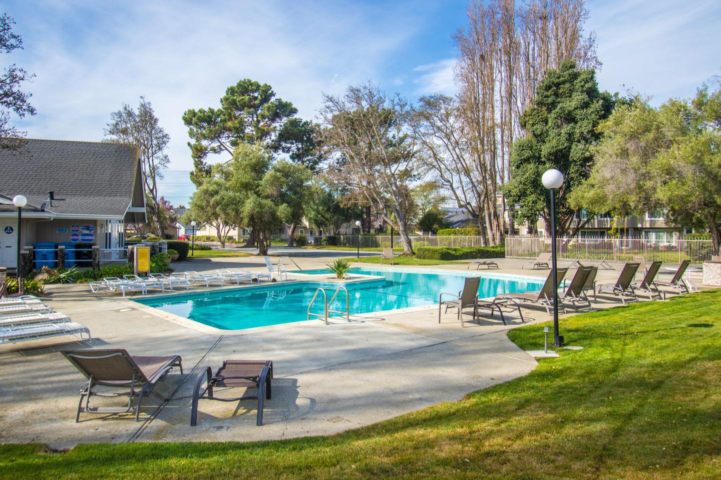 740 Pinta Lane Foster City, CA 94404 - Photo 30 of 33 a swimming pool with outdoor seating and yard