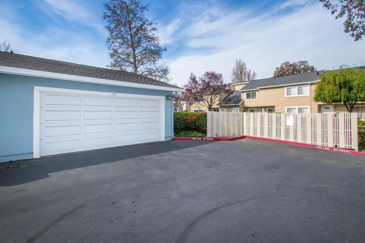 740 Pinta Lane Foster City, CA 94404 - Photo 6 of 33 a view of a house with a outdoor space and garage