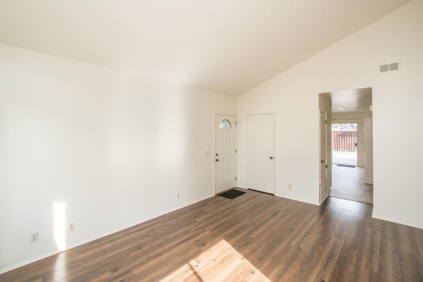 740 Pinta Lane Foster City, CA 94404 - Photo 10 of 33 a view of empty room with wooden floor
