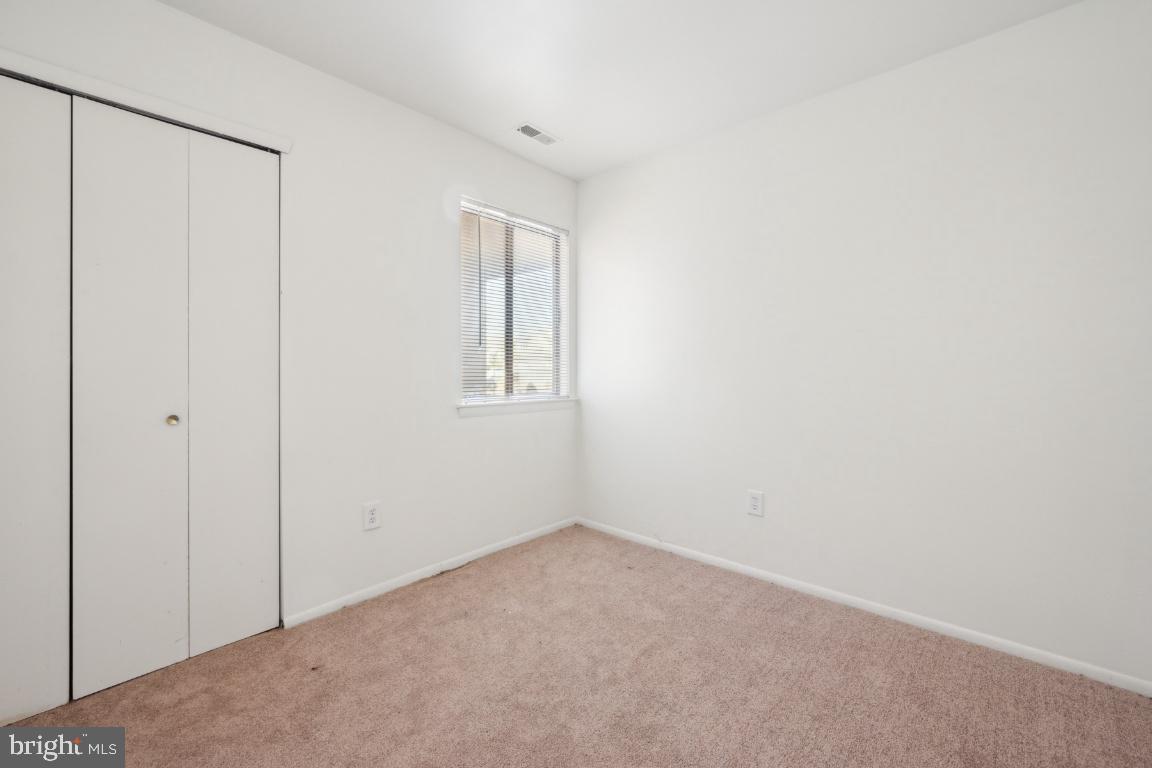 58 Sandra Road Voorhees, NJ 08043 - Photo 12 of 25 an empty room with windows