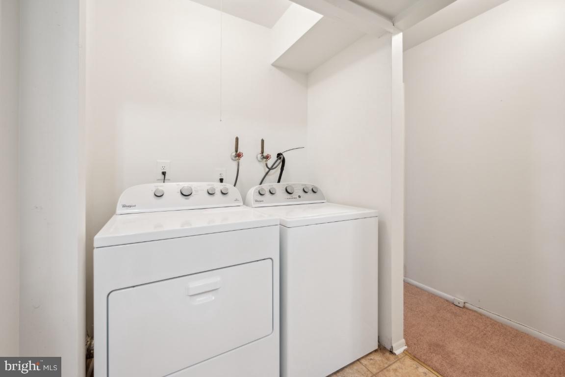 58 Sandra Road Voorhees, NJ 08043 - Photo 16 of 25 a utility room with dryer and washer