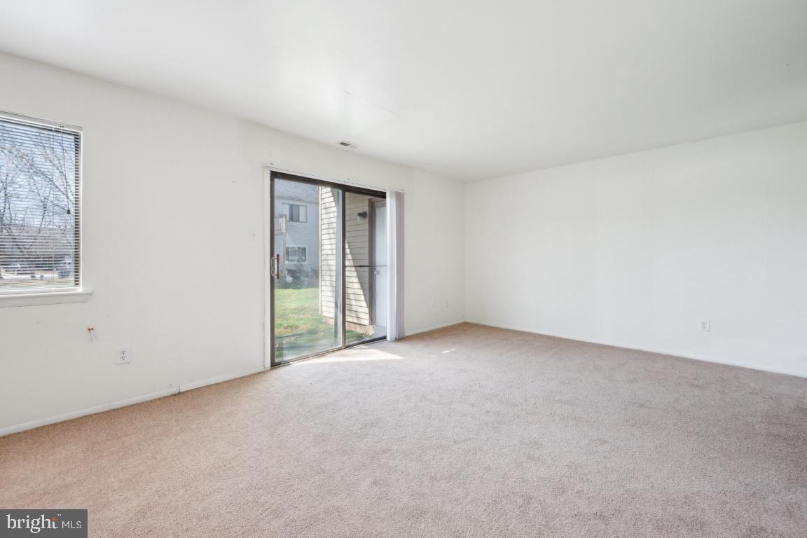 58 Sandra Road Voorhees, NJ 08043 - Photo 19 of 25 a view of an empty room with a window