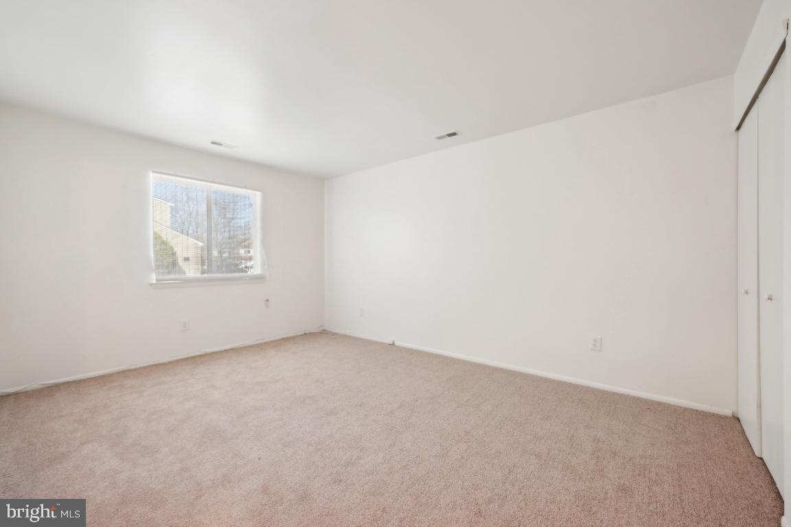 58 Sandra Road Voorhees, NJ 08043 - Photo 21 of 25 an empty room with windows