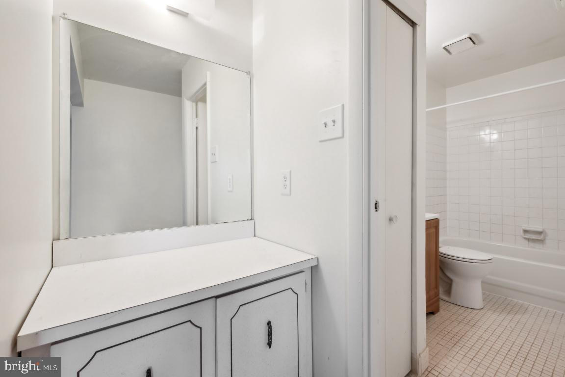 58 Sandra Road Voorhees, NJ 08043 - Photo 22 of 25 a bathroom with a sink a toilet and a shower