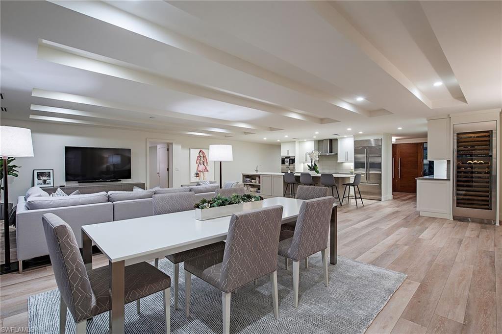 1600 Murex Lane Naples, FL 34102 - Photo 8 of 25 a view of a dining room with furniture