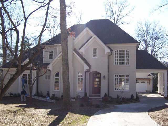421 Yarmouth Road Raleigh, NC 27608 - Photo 1 of 12 a front view of a house with a yard