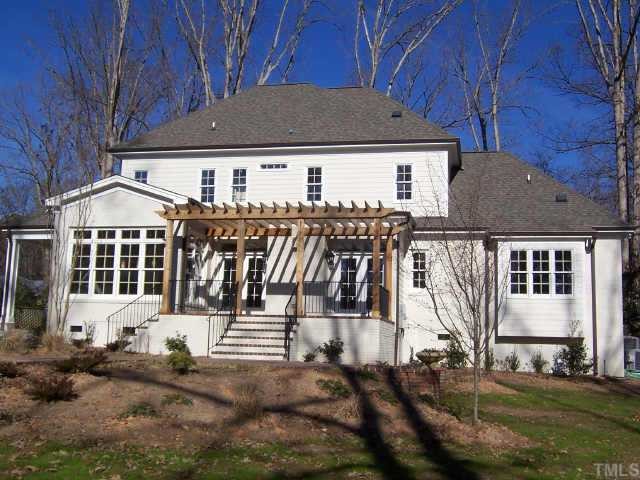 421 Yarmouth Road Raleigh, NC 27608 - Photo 12 of 12 a front view of a house with a yard