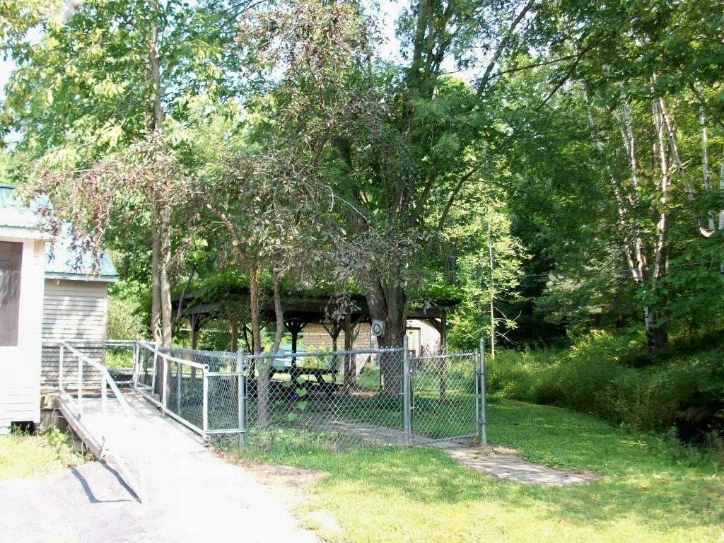 481 Pond Road Wales, ME 04280 - Photo 28 of 29 Back Ramp and Pergola-Patio Area
