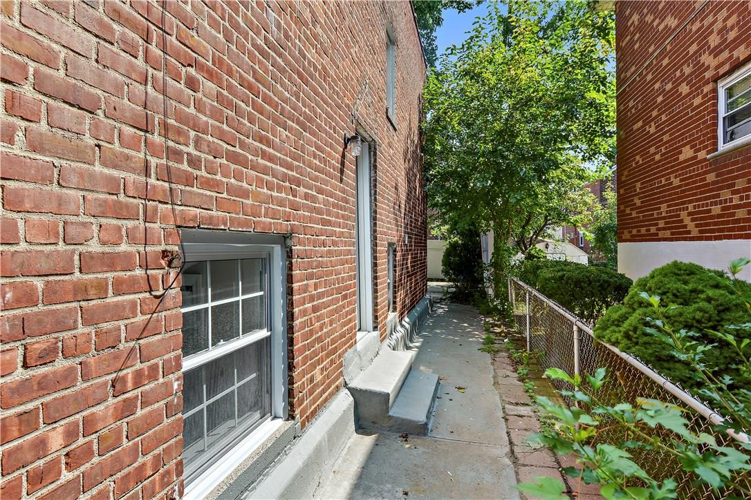2726 Mickle Avenue Bronx, NY 10469 - Photo 14 of 16 a view of a pathway with a house