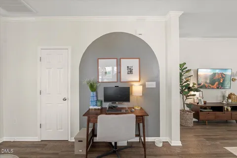 a view of a workspace with a living room