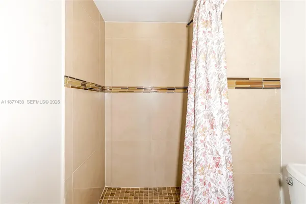 a view of bathroom with shower