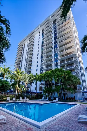 a view of swimming pool with outdoor seating and yard