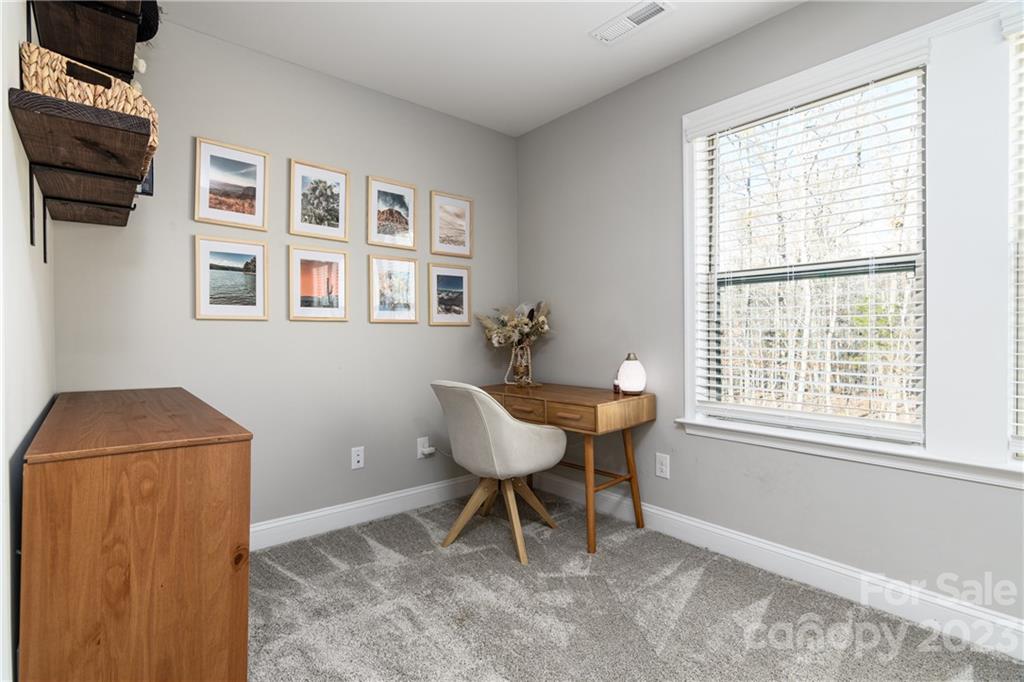 2036 Suttonview Road Fort Mill, SC 29708 - Photo 13 of 37 a workspace with furniture and a window