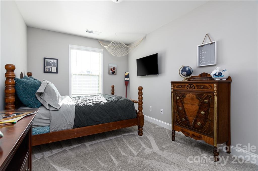 2036 Suttonview Road Fort Mill, SC 29708 - Photo 18 of 37 a bedroom with a bed and a television