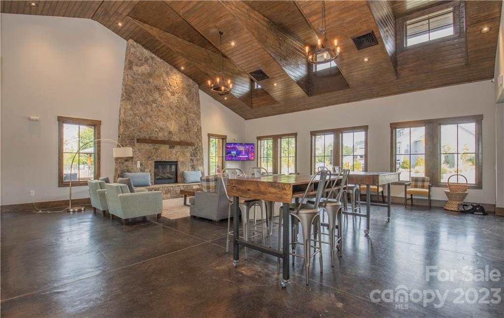 2036 Suttonview Road Fort Mill, SC 29708 - Photo 33 of 37 a dinning area with lots of furniture and wooden floor