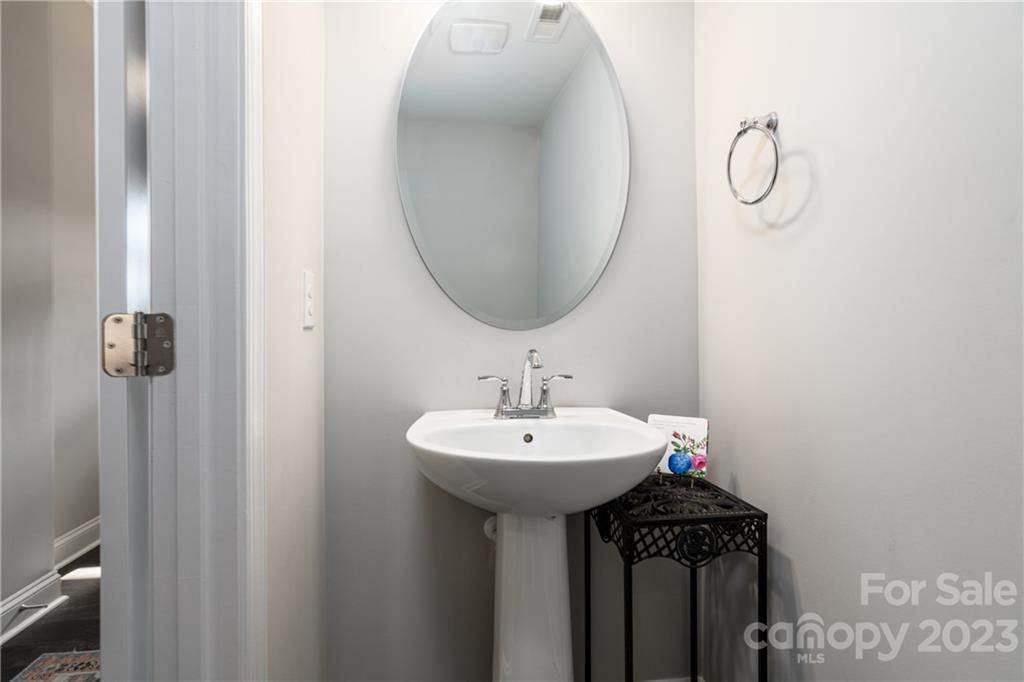 2036 Suttonview Road Fort Mill, SC 29708 - Photo 10 of 37 a bathroom with a sink a mirror and vanity