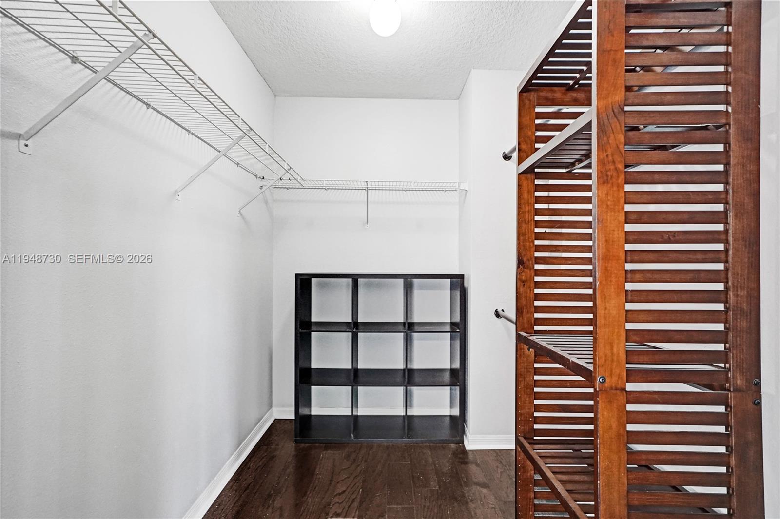 5502 Southwest 162nd Place Miami, FL 33185 - Photo 34 of 72 a view of a room with stairs and wooden floor