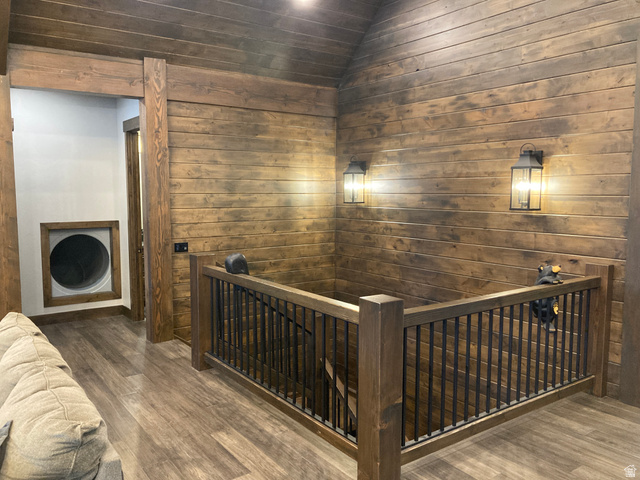 259 Meadow Drive Springville, UT 84663 - Photo 43 of 62 Hall featuring an upstairs landing, wooden walls, wood finished floors, and lofted ceiling