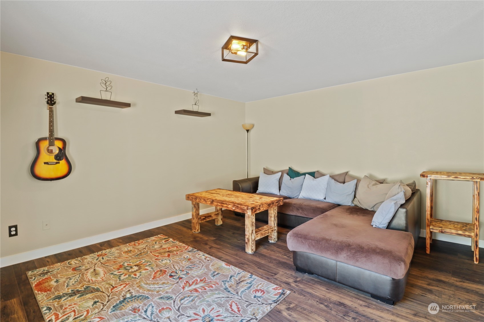 5412 187th Court Southwest Rochester, WA 98579 - Photo 12 of 37 a living room with furniture and rug